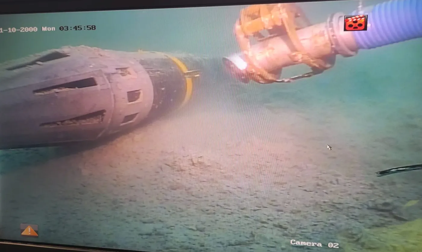 The Raptor Scout's suction dredging head working at the punch-out location, seen on the operator's camera feed from the support vessel